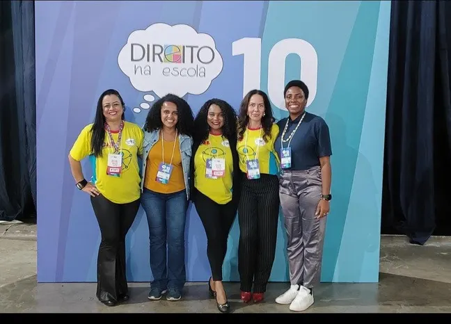 Dra. Bruna Marques Vitebro e colegas no evento Direito na Escola